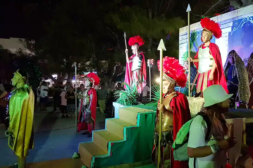 Colorful Easter procession in Mexico featuring participants in vibrant costumes celebrating the holiday.